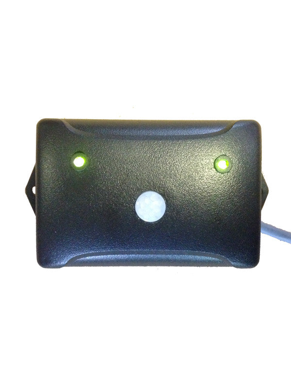 chicken coop predator motion detector with green lights displaying