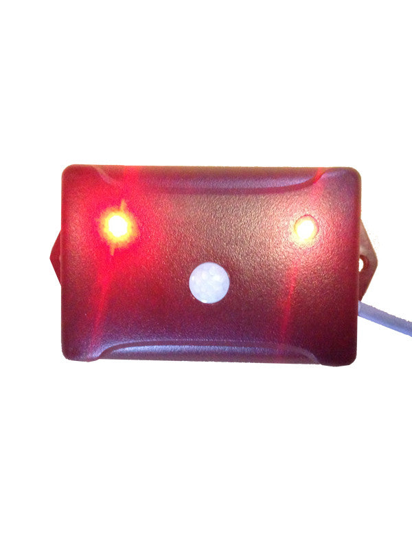 chicken coop predator motion detector with red lights displaying