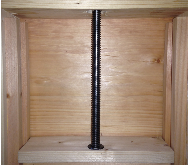 back side of chicken coop automatic door with the solid steel worm drive displayed