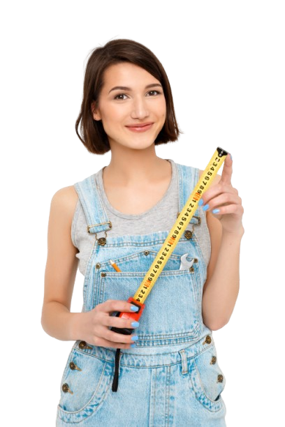 woman in bib overalls holding a measuring tape